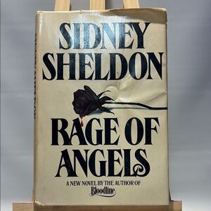 Sidney Sheldon 'Rage of Angels' Book Cover Art - Black and Cream